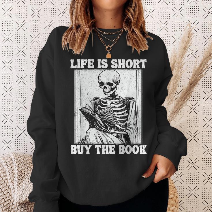 Life Is Short Buy The Book Skeleton Reading Book Sweatshirt Gifts for Her