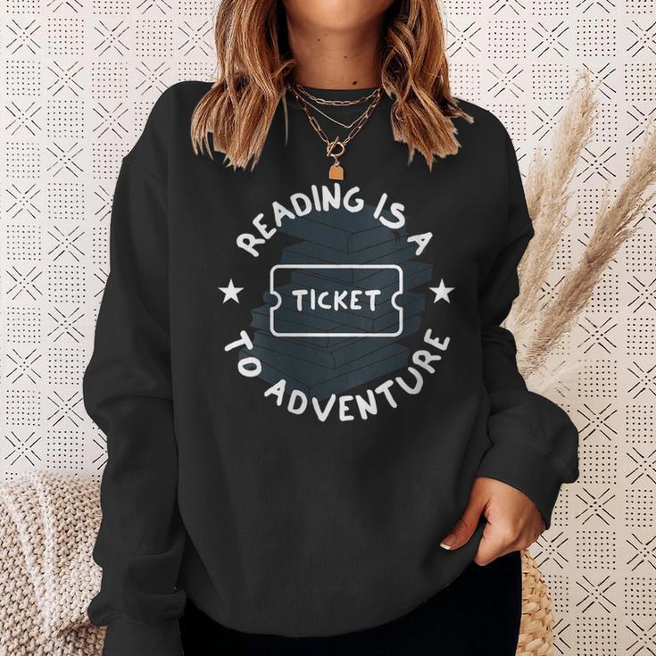 Reading Is A Ticket To Adventure Book Lover Reading Teacher Sweatshirt Gifts for Her