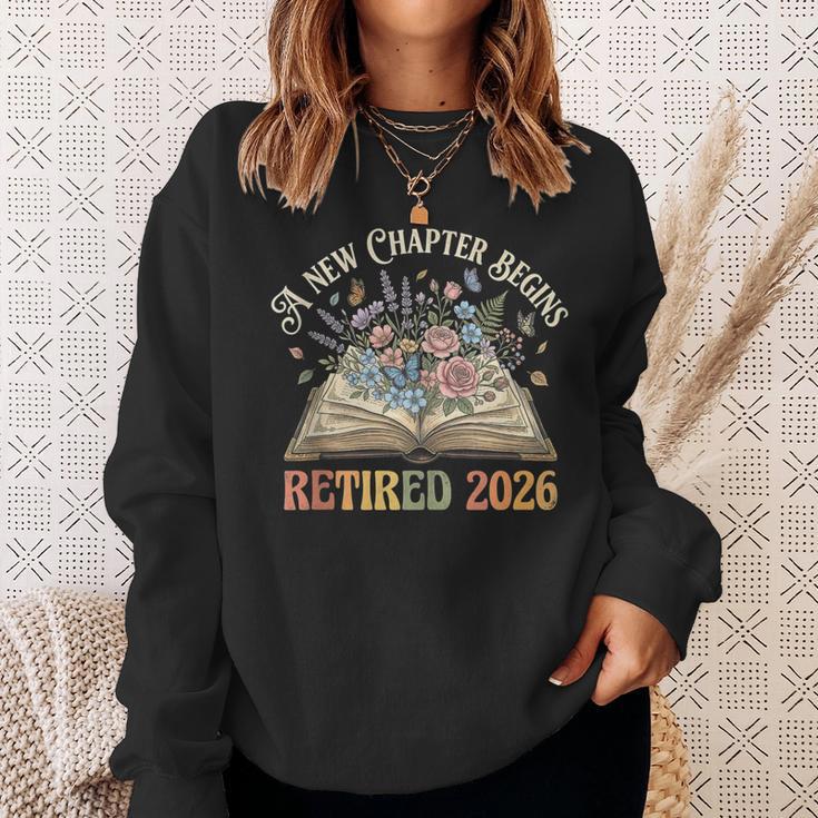 Retired 2026 A New Chapter Begins Floral Book Retirement Sweatshirt Gifts for Her Retired 2026 A New Chapter Begins Floral Book Retirement Sweatshirt Gifts for Her