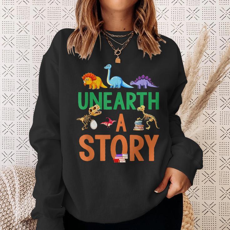 Summer Reading 2026 Dinosaurs Book Lover Unearth A Story Sweatshirt Gifts for Her Summer Reading 2026 Dinosaurs Book Lover Unearth A Story Sweatshirt Gifts for Her