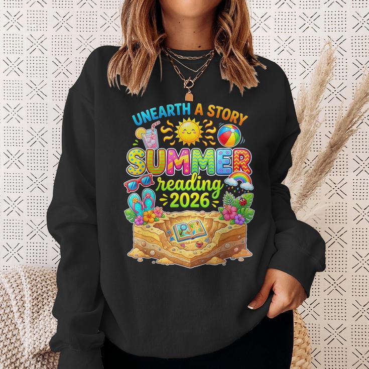 Summer Reading 2026 Unearth a Story Book Reading Sweatshirt Gifts for Her Summer Reading 2026 Unearth a Story Book Reading Sweatshirt Gifts for Her