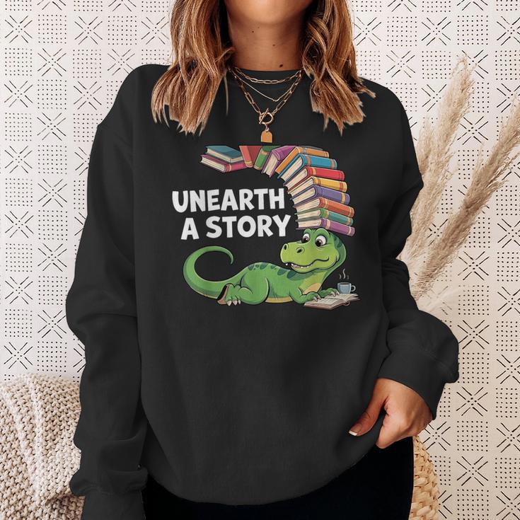 Summer Reading 2026 Unearth a Story Theme Dinosaur Book Nerd Sweatshirt Gifts for Her
