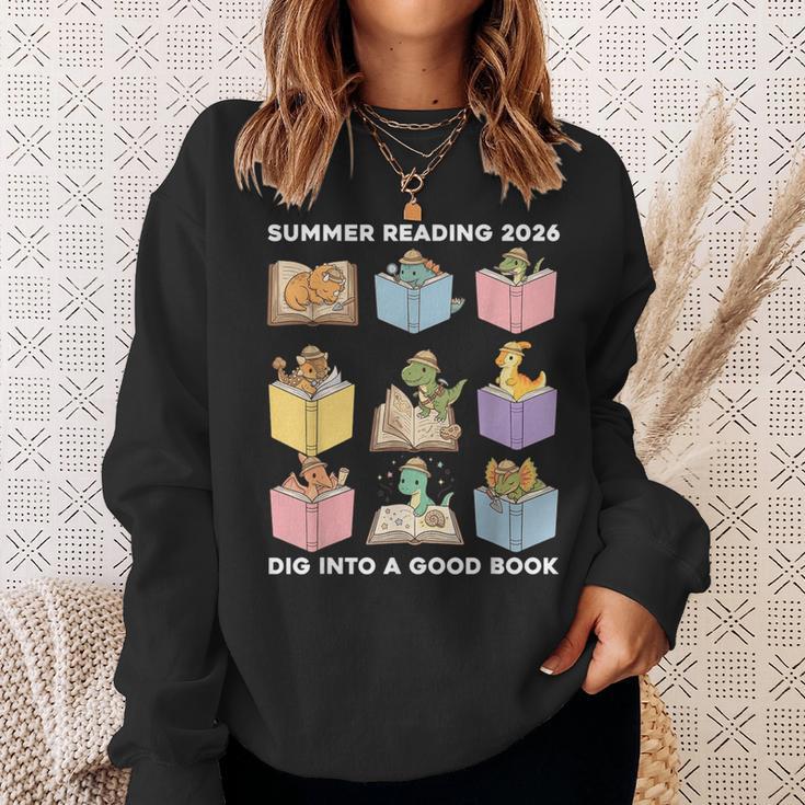 Summer Reading 2026 Unearth A Story Dinosaur Books Readers Sweatshirt Gifts for Her