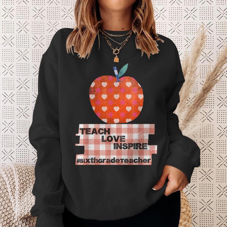 Teach Love Inspire Valentines Day Book 6th Grade Teacher Sweatshirt Gifts for Her