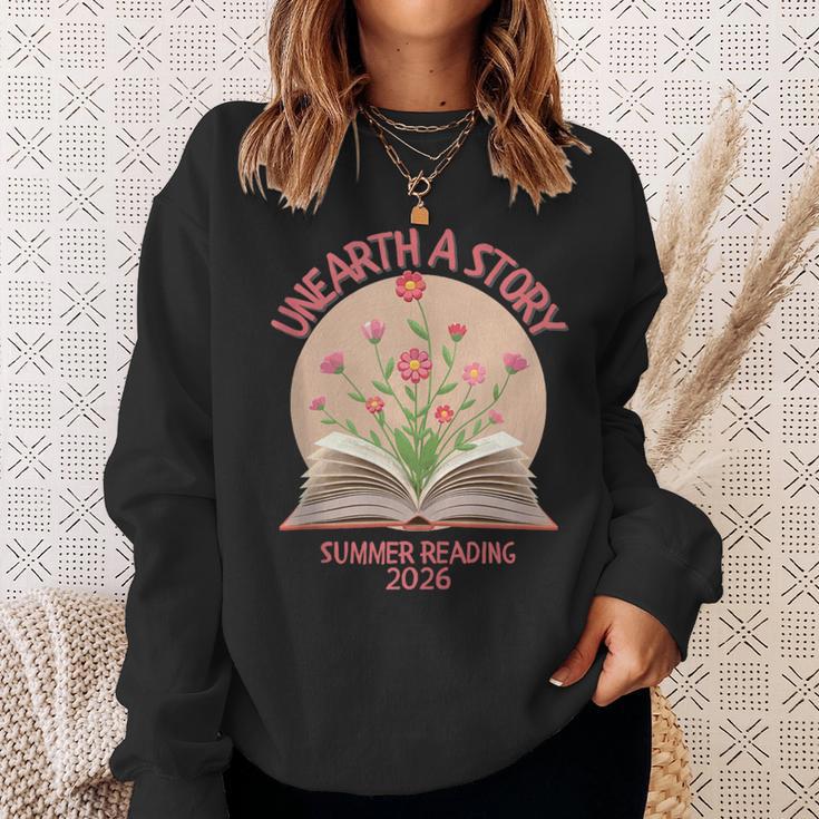 Unearth a Story 2026 Summer Reading Program Flowers Book Sweatshirt Gifts for Her Unearth a Story 2026 Summer Reading Program Flowers Book Sweatshirt Gifts for Her