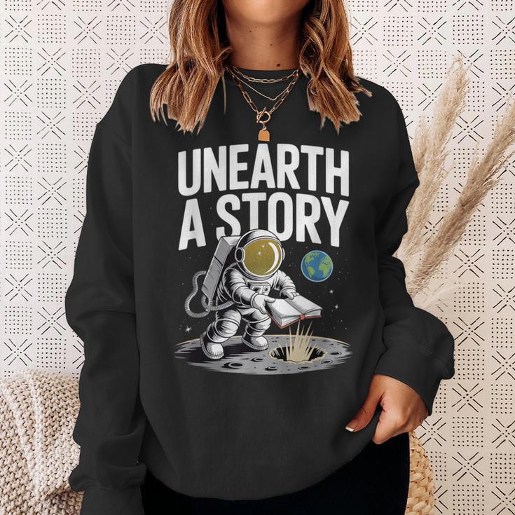Unearth A Story Astronaut Finds Book On The Moon Sweatshirt Gifts for Her