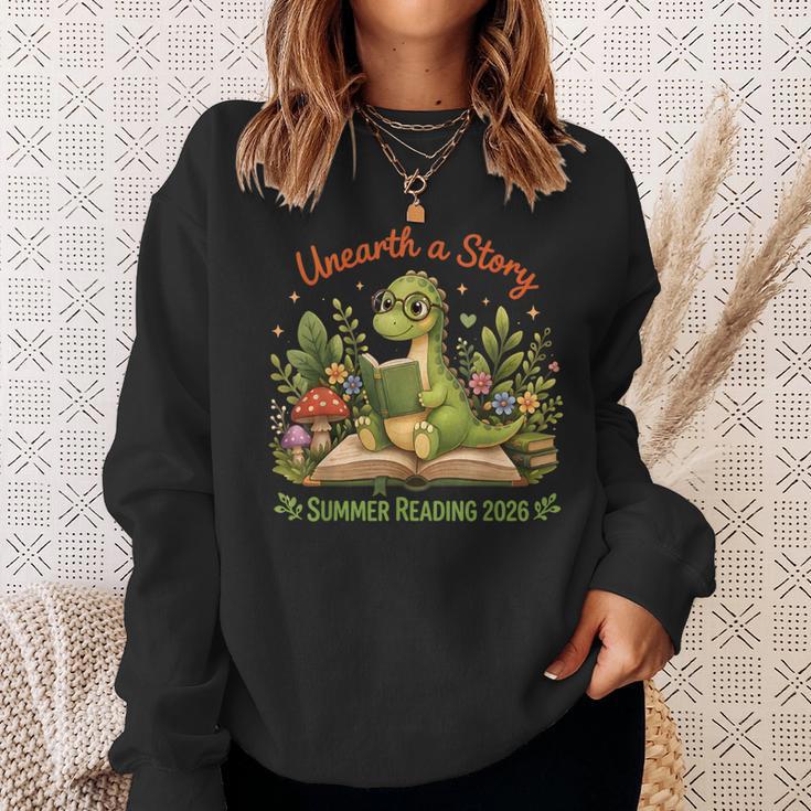 Unearth A Story Summer Reading 2026 Dinosaur Reading Books Sweatshirt Gifts for Her