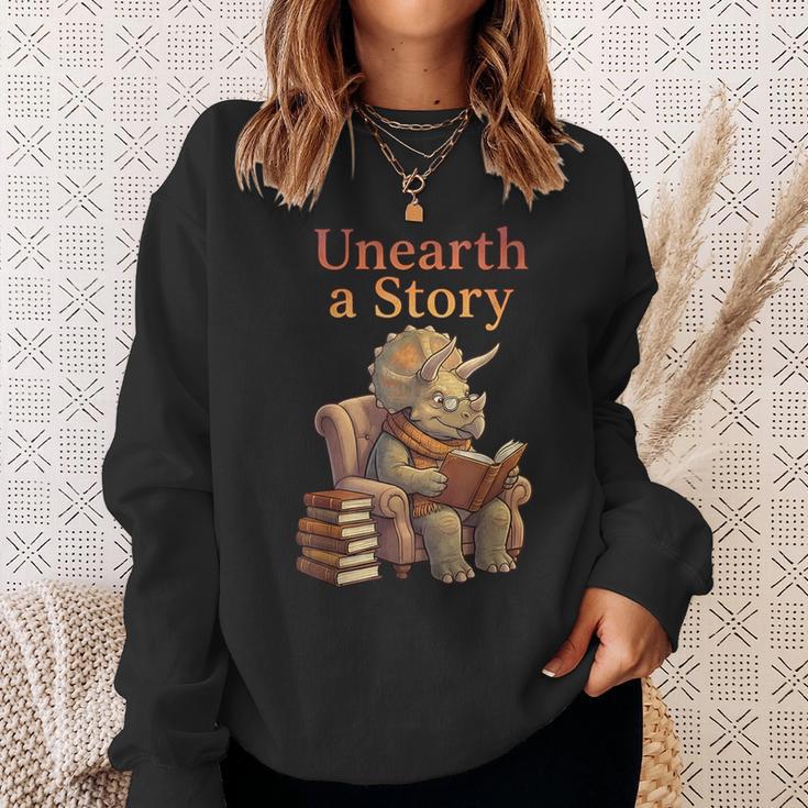 Unearth a Story Triceratops Dinosaur Reading Books Dino Sweatshirt Gifts for Her