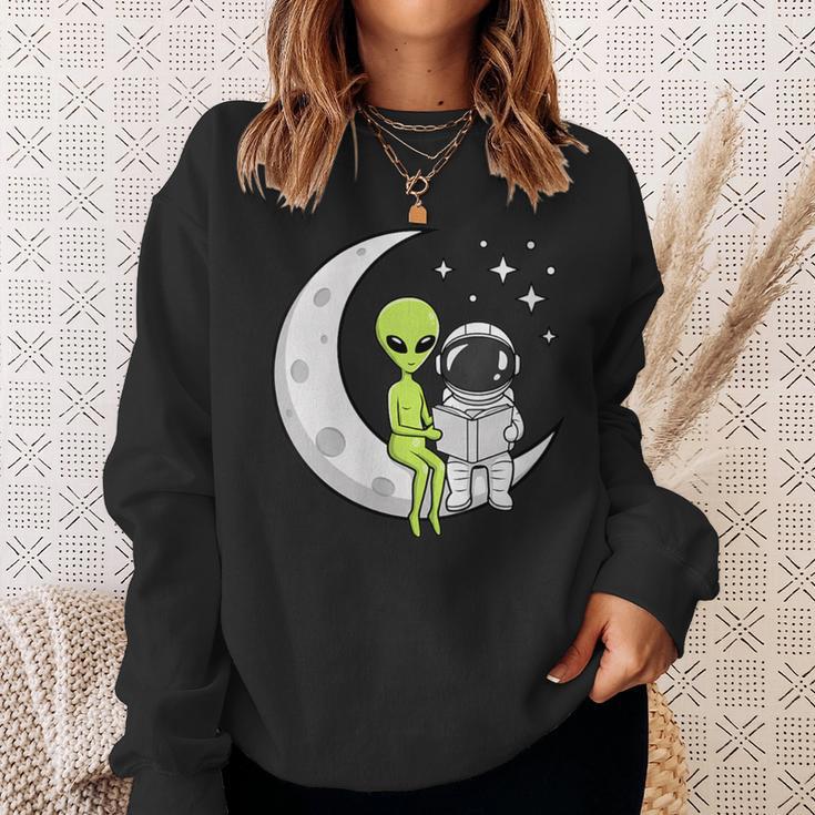 Women's Alien And Astronaut Reading On Moon Kids Sci Fi Book Sweatshirt Gifts for Her