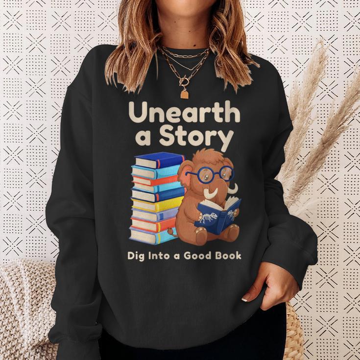 Women's Unearth A Story Reading Mammoth Prehistoric Book Librarian Sweatshirt Gifts for Her