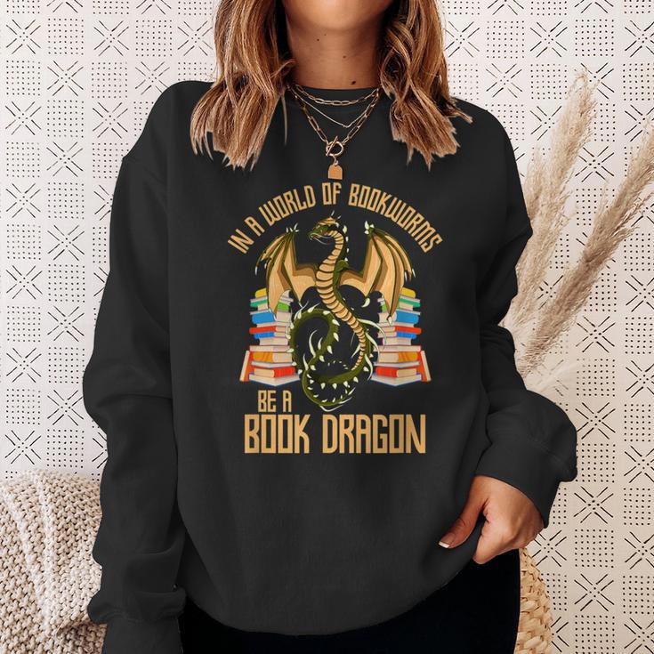 In A World Of Bookworms Be A Book Dragon Sweatshirt Gifts for Her