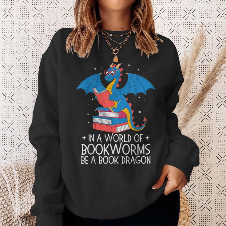 In A World Full Of Bookworms Be A Book Dragon Reading Sweatshirt Gifts for Her In A World Full Of Bookworms Be A Book Dragon Reading Sweatshirt Gifts for Her