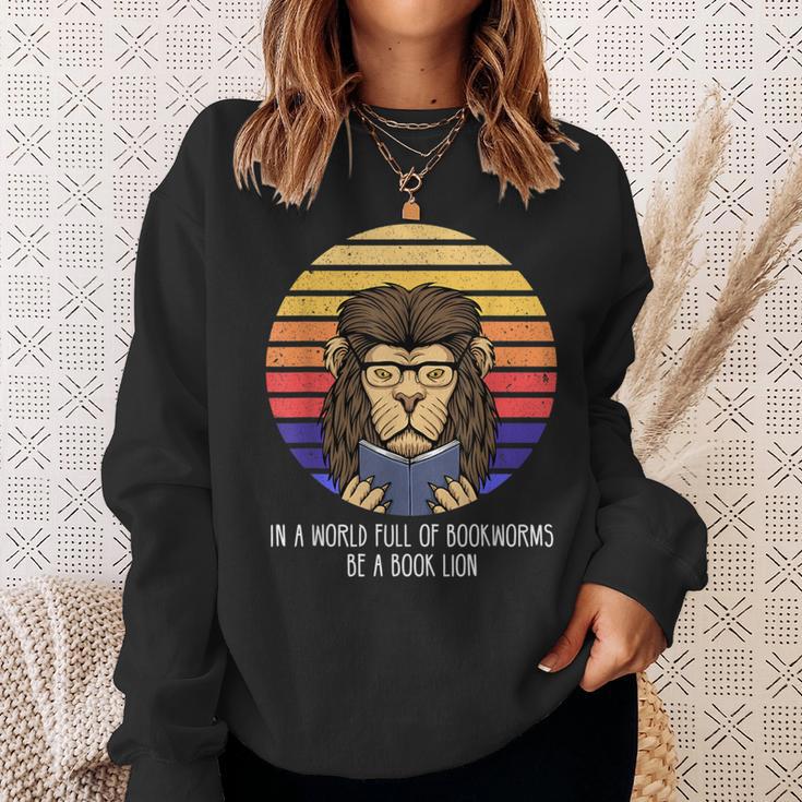 In A World Full Of Bookworms Be A Book Lion Dragon Reading Sweatshirt Gifts for Her