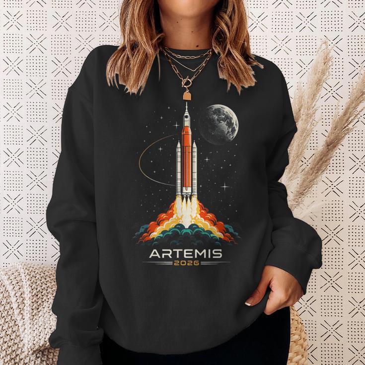 アルテミスii宇宙ロケット打ち上げミッショントゥザムーンアルテミス2 スウェットシャツ 彼女への贈り物