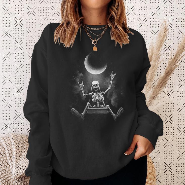 スケルトンロックオンムーン不気味なハロウィンロックバンド 怖い 長袖tシャツ スウェットシャツ 彼女への贈り物
