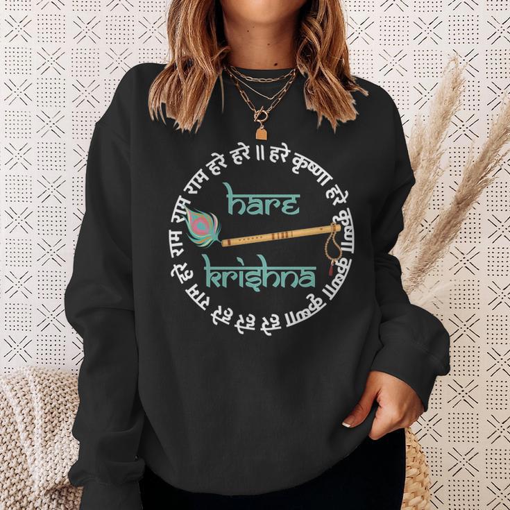 ハレ クリシュナ マントラ インドフルートピーコックフェザー トゥルシーマーラー 長袖tシャツ スウェットシャツ 彼女への贈り物