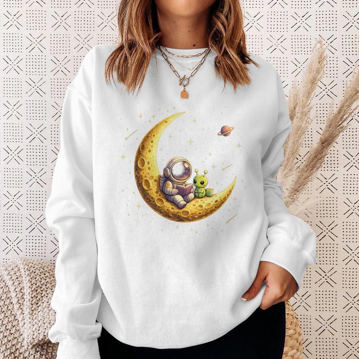 Astronaut Reading Book To Alien Moon Space Astronomy Sweatshirt Gifts for Her
