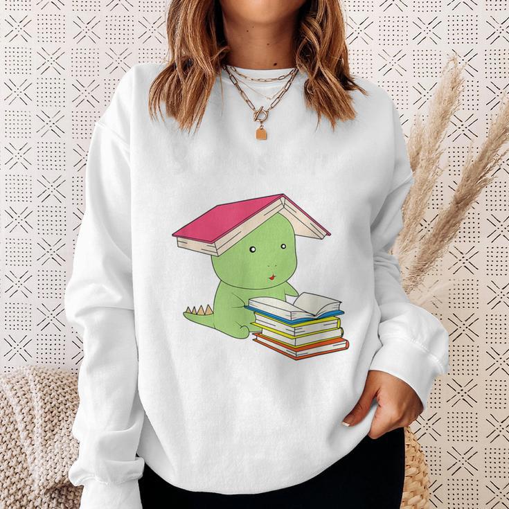 Bookasaurus T-Rex Reading Dinosaur Book PunShirt Sweatshirt Gifts for Her Bookasaurus T-Rex Reading Dinosaur Book PunShirt Sweatshirt Gifts for Her
