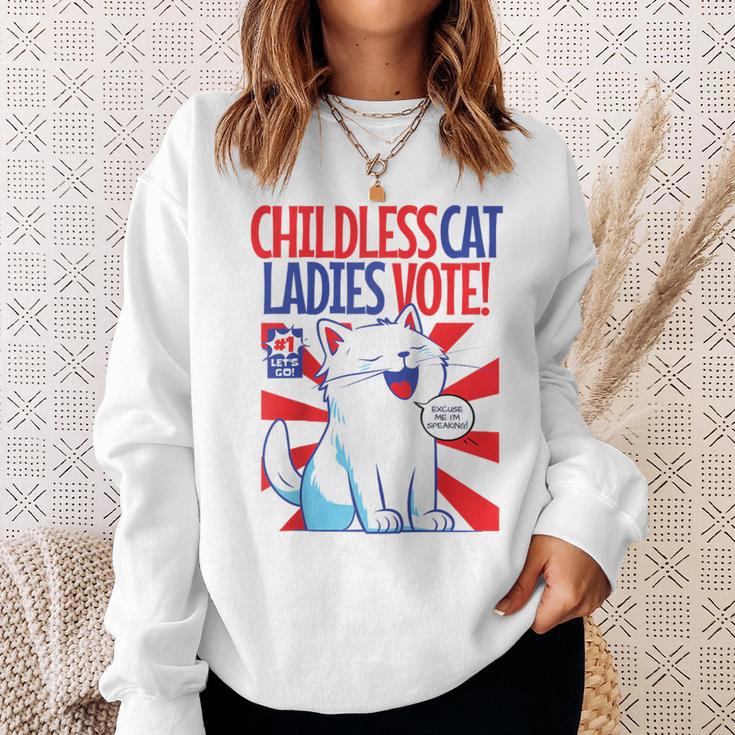 Childless Cat Ladies Vote Kamala Harris Cute Comic Book Cat Raglan Baseball Tee Sweatshirt Gifts for Her