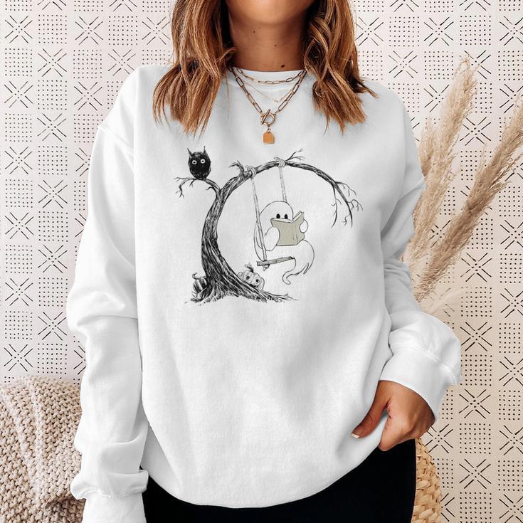 Cute Ghost Swinging Reading Book Halloween Ghost Costume Sweatshirt Gifts for Her