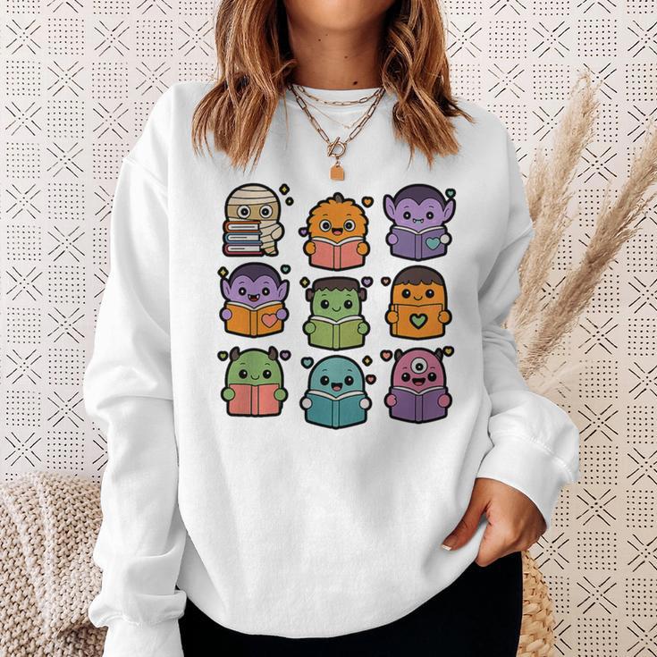 Halloween Monsters Reading Books Pattern Spooky Kawaii Anime Premium Tri-Blend Sweatshirt Gifts for Her