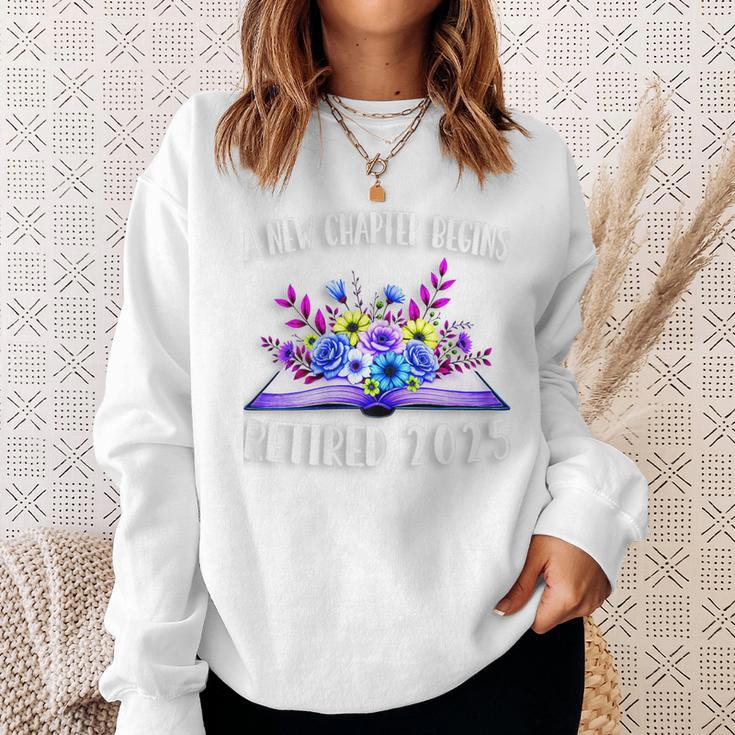 A New Chapter Begins Retired 2025 Floral Book Retirement Sweatshirt Gifts for Her A New Chapter Begins Retired 2025 Floral Book Retirement Sweatshirt Gifts for Her