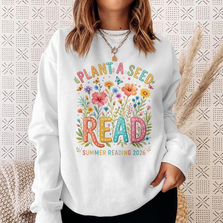Plant A Seed Read Library Summer Reading 2026 Floral Book Sweatshirt Gifts for Her Plant A Seed Read Library Summer Reading 2026 Floral Book Sweatshirt Gifts for Her