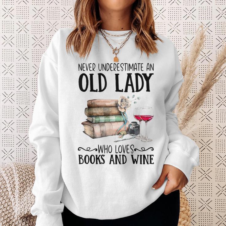 Never Underestimate An Old Lady Who Loves Books And Wine Sweatshirt Gifts for Her