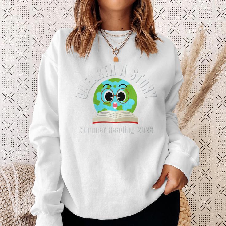 Unearth a Story Summer 2026 Reading Program Earth Read Book Premium Tri-Blend Sweatshirt Gifts for Her