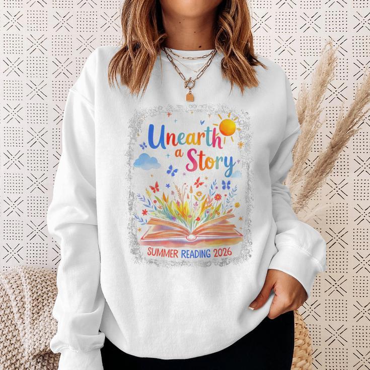 Unearth a Story Summer Reading 2026 Wildflower Book Library Sweatshirt Gifts for Her Unearth a Story Summer Reading 2026 Wildflower Book Library Sweatshirt Gifts for Her