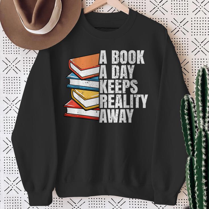 A Book A Day Keeps Reality Away Bookworm Sweatshirt Gifts for Old Women