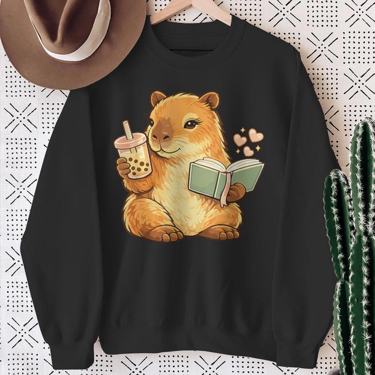 Capybara Reading a Book With Bubble Tea Sweatshirt Gifts for Old Women