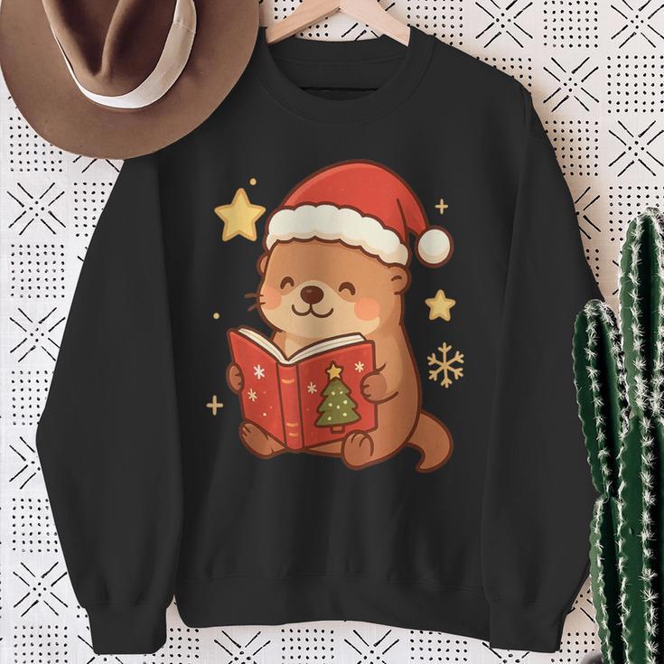 Cute Christmas Book Otter Reading Snowy Holiday Story Sweatshirt Gifts for Old Women