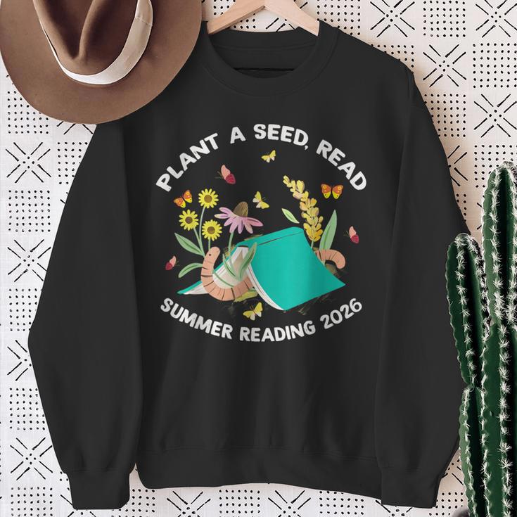 Plant a Seed Read Summer Reading 2026 Butterfly Book Floral Sweatshirt Gifts for Old Women Plant a Seed Read Summer Reading 2026 Butterfly Book Floral Sweatshirt Gifts for Old Women