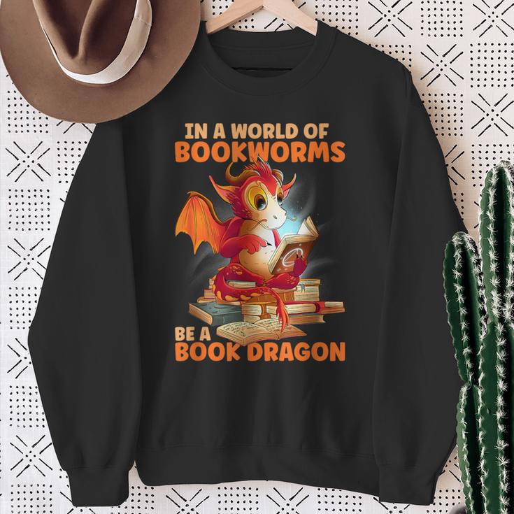 Read Be A Book Dragon Bookworm Sweatshirt Gifts for Old Women