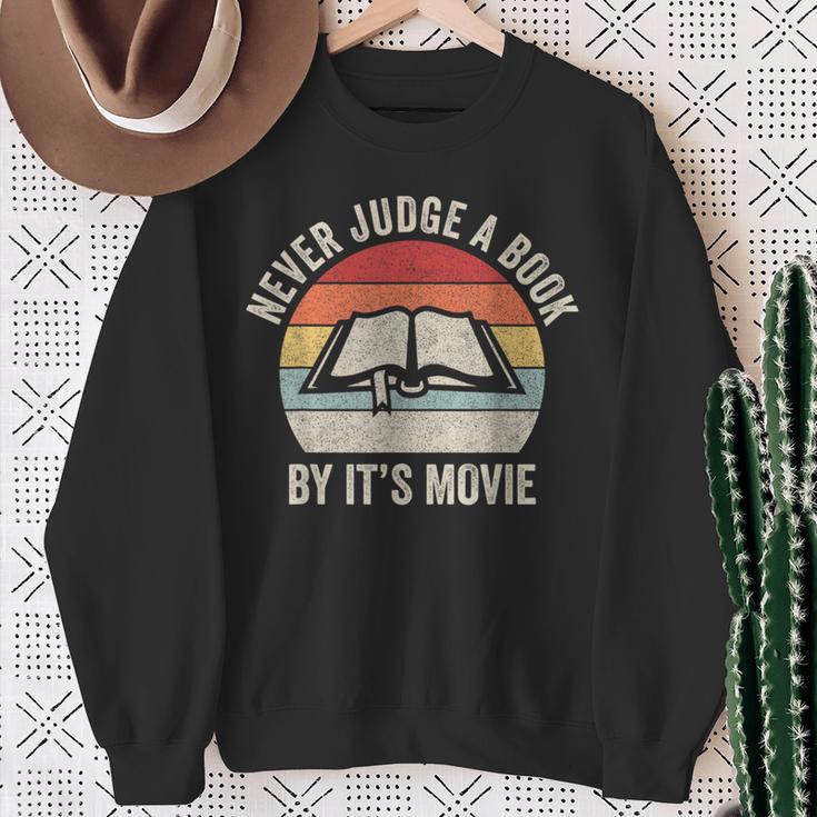 Retro Never Judge A Book By Its Movie Shirt Book Reader Sweatshirt Gifts for Old Women Retro Never Judge A Book By Its Movie Shirt Book Reader Sweatshirt Gifts for Old Women