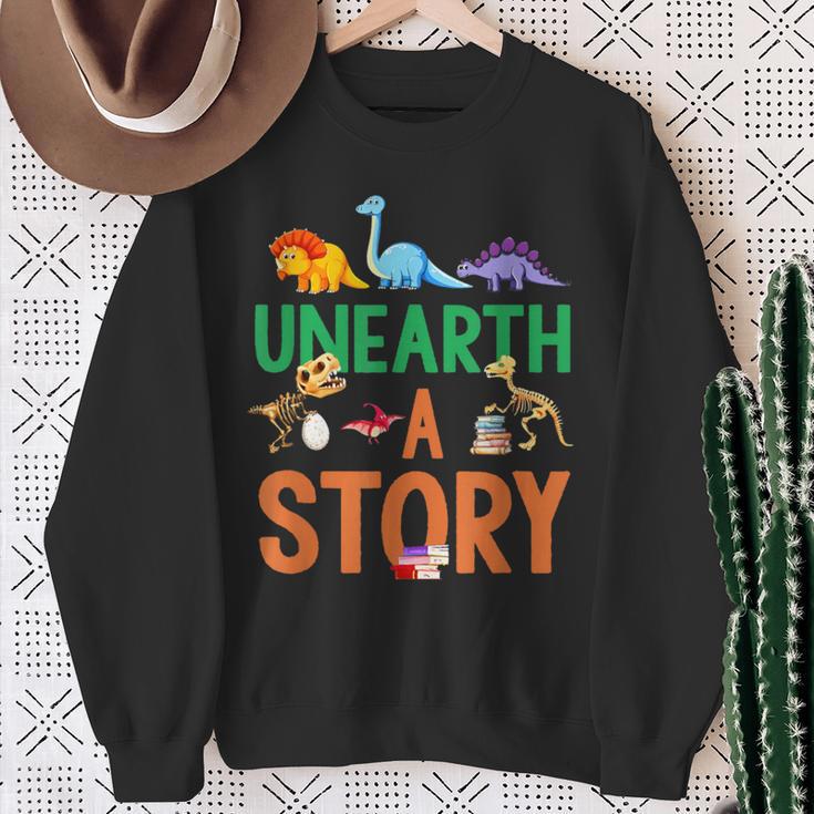 Summer Reading 2026 Dinosaurs Book Lover Unearth A Story Sweatshirt Gifts for Old Women Summer Reading 2026 Dinosaurs Book Lover Unearth A Story Sweatshirt Gifts for Old Women