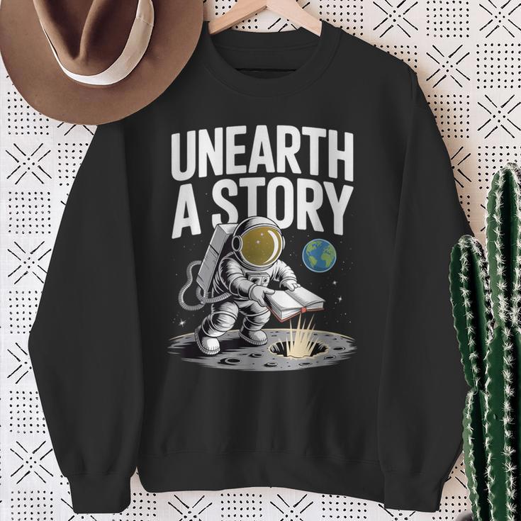 Unearth A Story Astronaut Finds Book On The Moon Sweatshirt Gifts for Old Women
