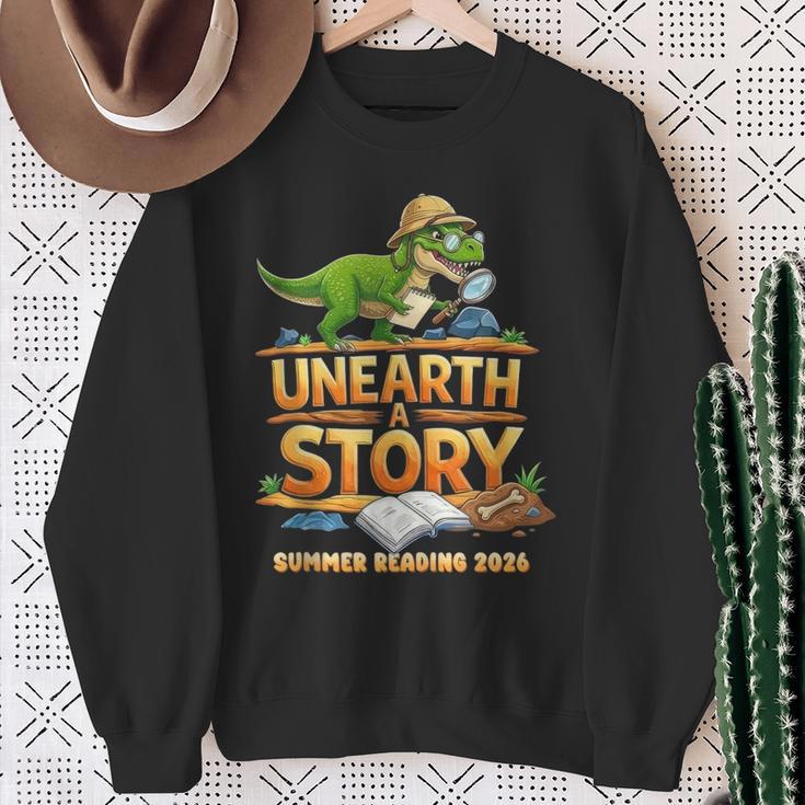 Unearth a Story Dinosaur Reading Books Summer 2026 Sweatshirt Gifts for Old Women