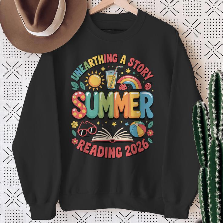 Unearth a Story Summer 2026 Summer Reading Program Book Sweatshirt Gifts for Old Women Unearth a Story Summer 2026 Summer Reading Program Book Sweatshirt Gifts for Old Women