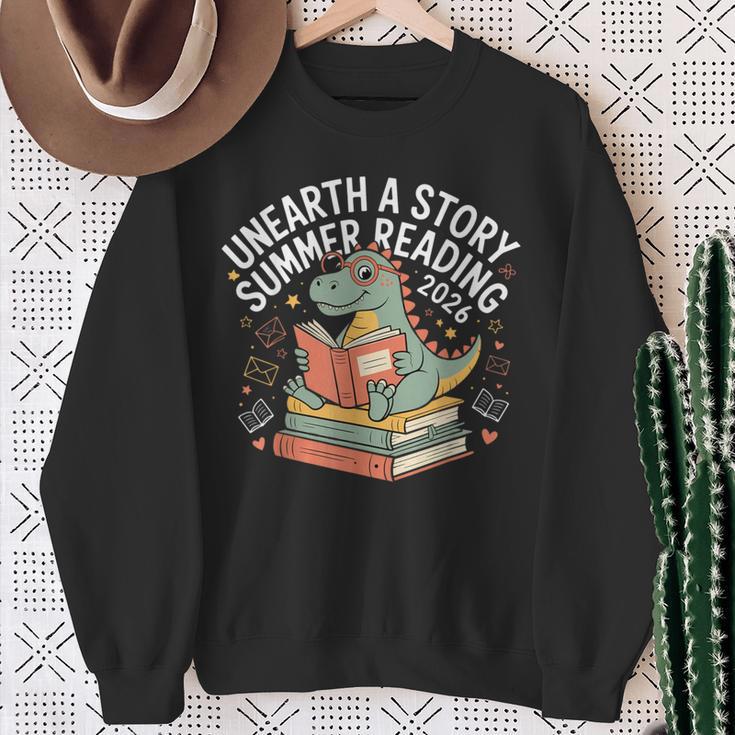 Unearth A Story Summer Reading 2026 Dinosaur Books Sweatshirt Gifts for Old Women