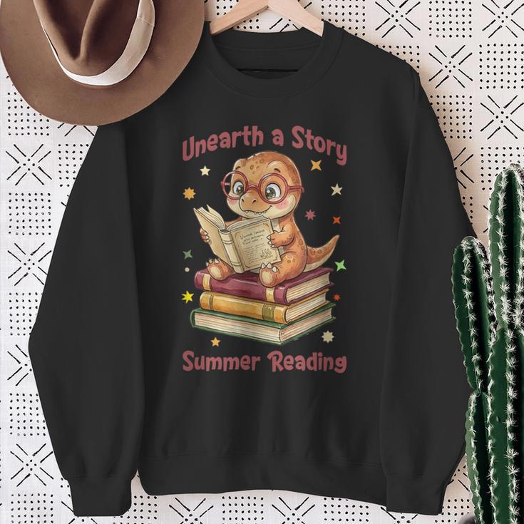 Unearth a Story Summer Reading T-Rex Book Lover Sweatshirt Gifts for Old Women Unearth a Story Summer Reading T-Rex Book Lover Sweatshirt Gifts for Old Women