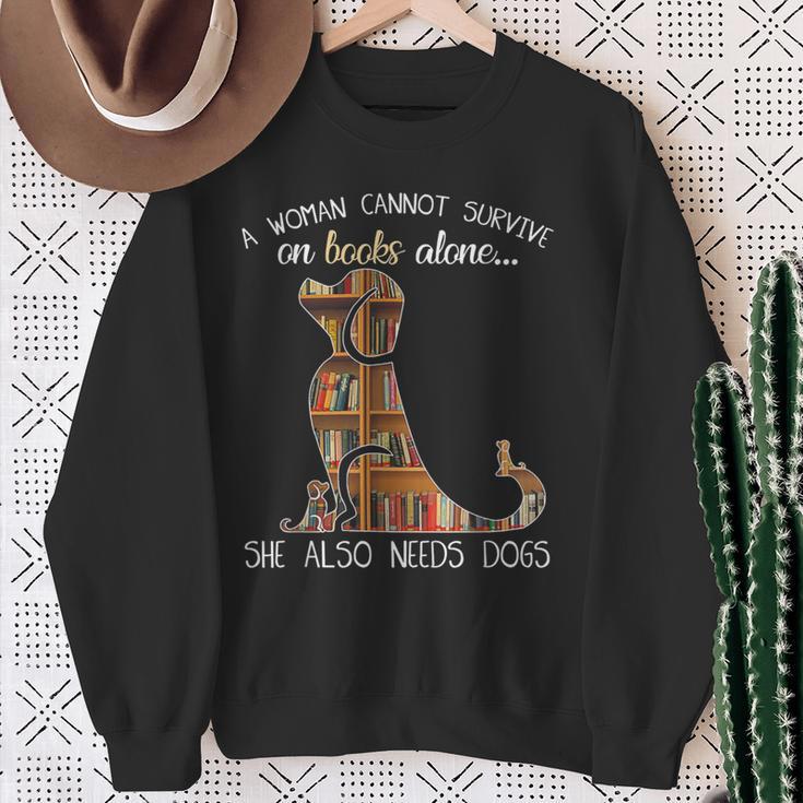 A Woman Cannot Survive On Books Alone She Also Needs Dogs Sweatshirt Gifts for Old Women A Woman Cannot Survive On Books Alone She Also Needs Dogs Sweatshirt Gifts for Old Women