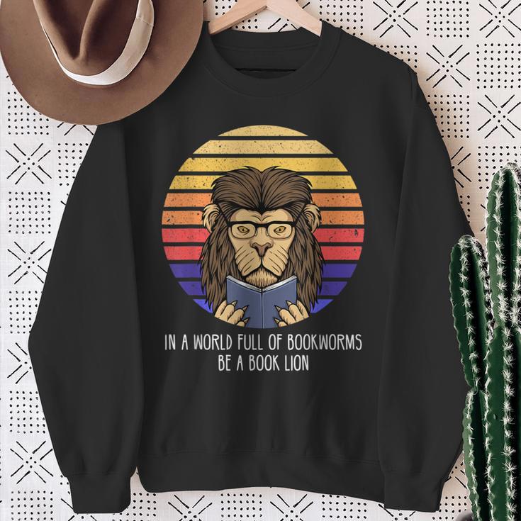 In A World Full Of Bookworms Be A Book Lion Dragon Reading Sweatshirt Gifts for Old Women