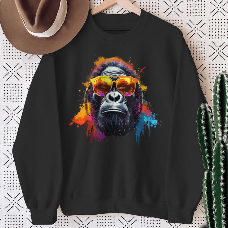 ヘッドフォンとサングラスをかけたdjモンキー音楽パーティーモンキー スウェットシャツ 年配の女性への贈り物