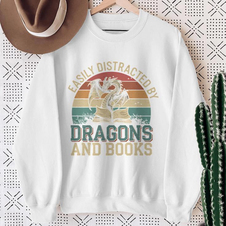 Easily Distracted By Books & Dragons Bookworm Reading Sweatshirt Gifts for Old Women