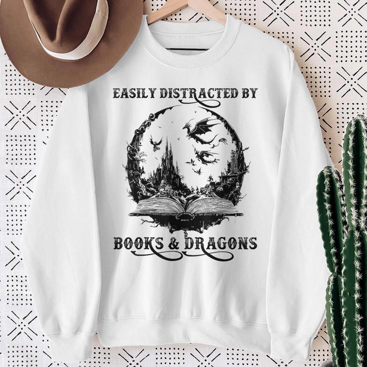 Easily Distracted By Books & Dragons Librarian Book Lover Sweatshirt Gifts for Old Women