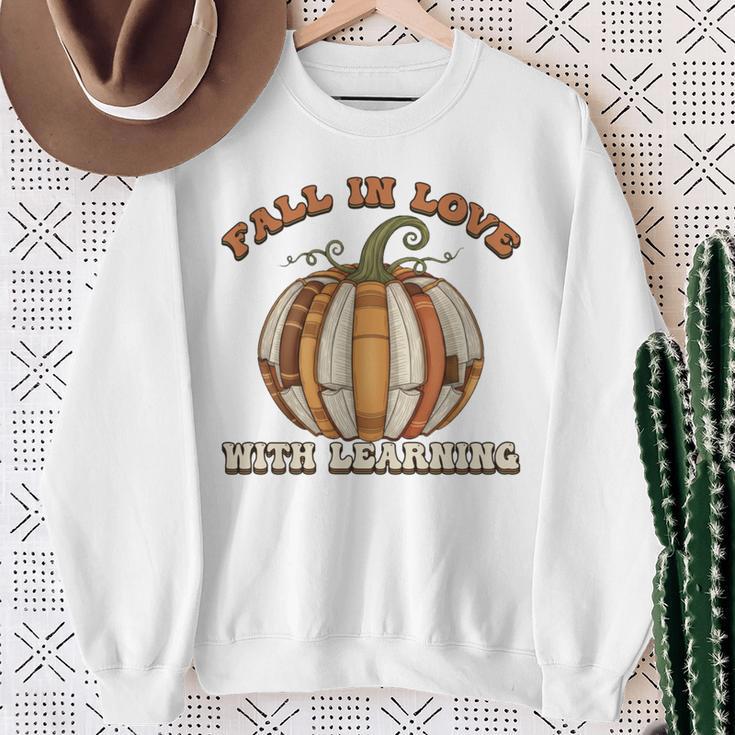 Fall In Love With Learning Books Pumpkin Autum Thanksgiving Sweatshirt Gifts for Old Women