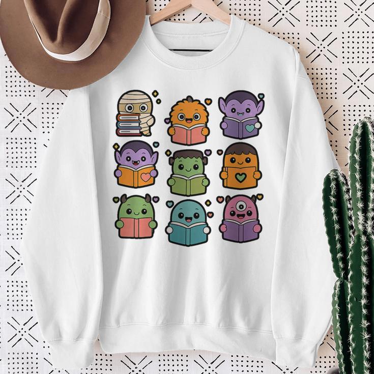 Halloween Monsters Reading Books Pattern Spooky Kawaii Anime Premium Tri-Blend Sweatshirt Gifts for Old Women