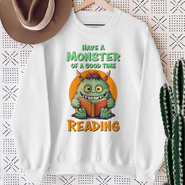 Halloween Teacher Librarian Monster Reading Books Performance Sweatshirt Gifts for Old Women Halloween Teacher Librarian Monster Reading Books Performance Sweatshirt Gifts for Old Women